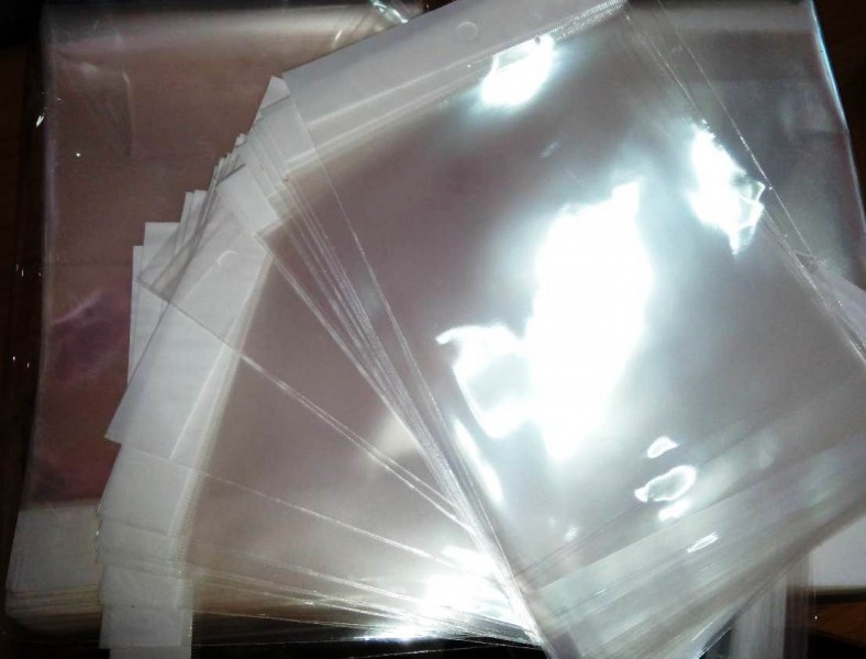 ถุงแก้วหัวมุกฝากาว 1.5x7 นิ้ว+หัวมุก 1 นิ้ว +ฝากาว เจาะรูกลม