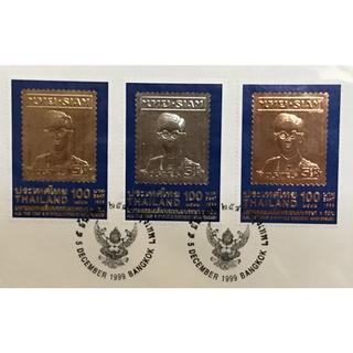 ซองวันแรกจำหน่ายตราไปรษณียากรที่ระลึกมหามงคลเฉลิมพระชนมพรรษา 6 รอบ (ชุด 4) แสตมป์เงิน ทอง นาค (3 กษัตริย์)